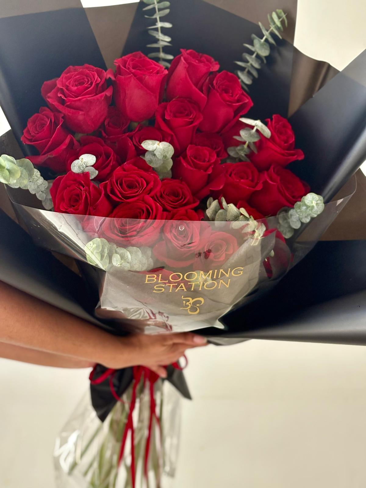 24 red roses bouquet with eucaliptus